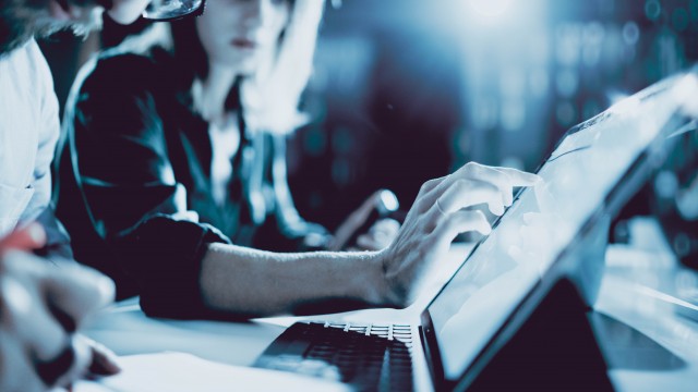 Man and woman on laptop