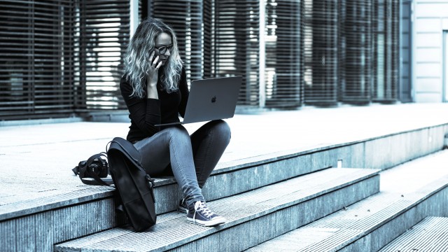 women-on-laptop-outside